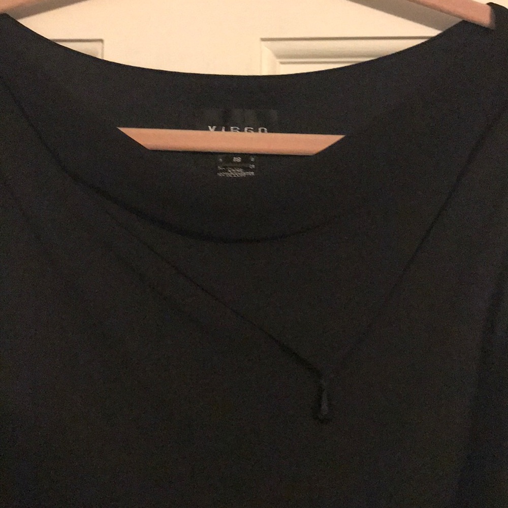 Elegant asymmetric black dress with fun neckline